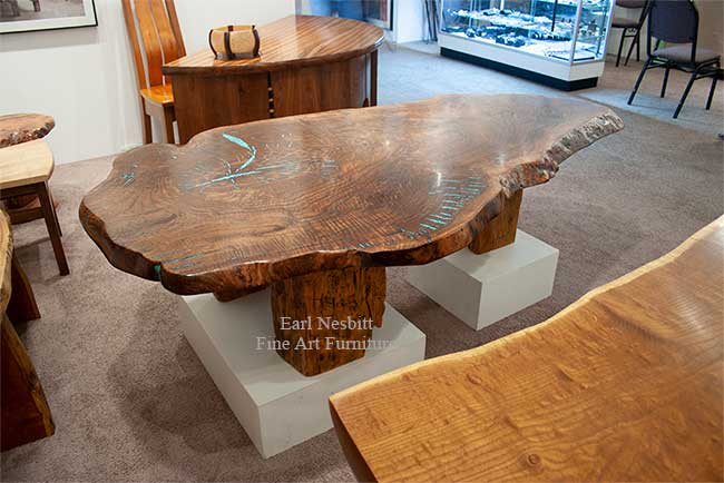 claro walnut slab coffee table in booth at show